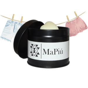 black tin vegan candle fresh linen, clean and fresh scent with carnation, rose, jasmine, lily, musk, and sandalwood notes